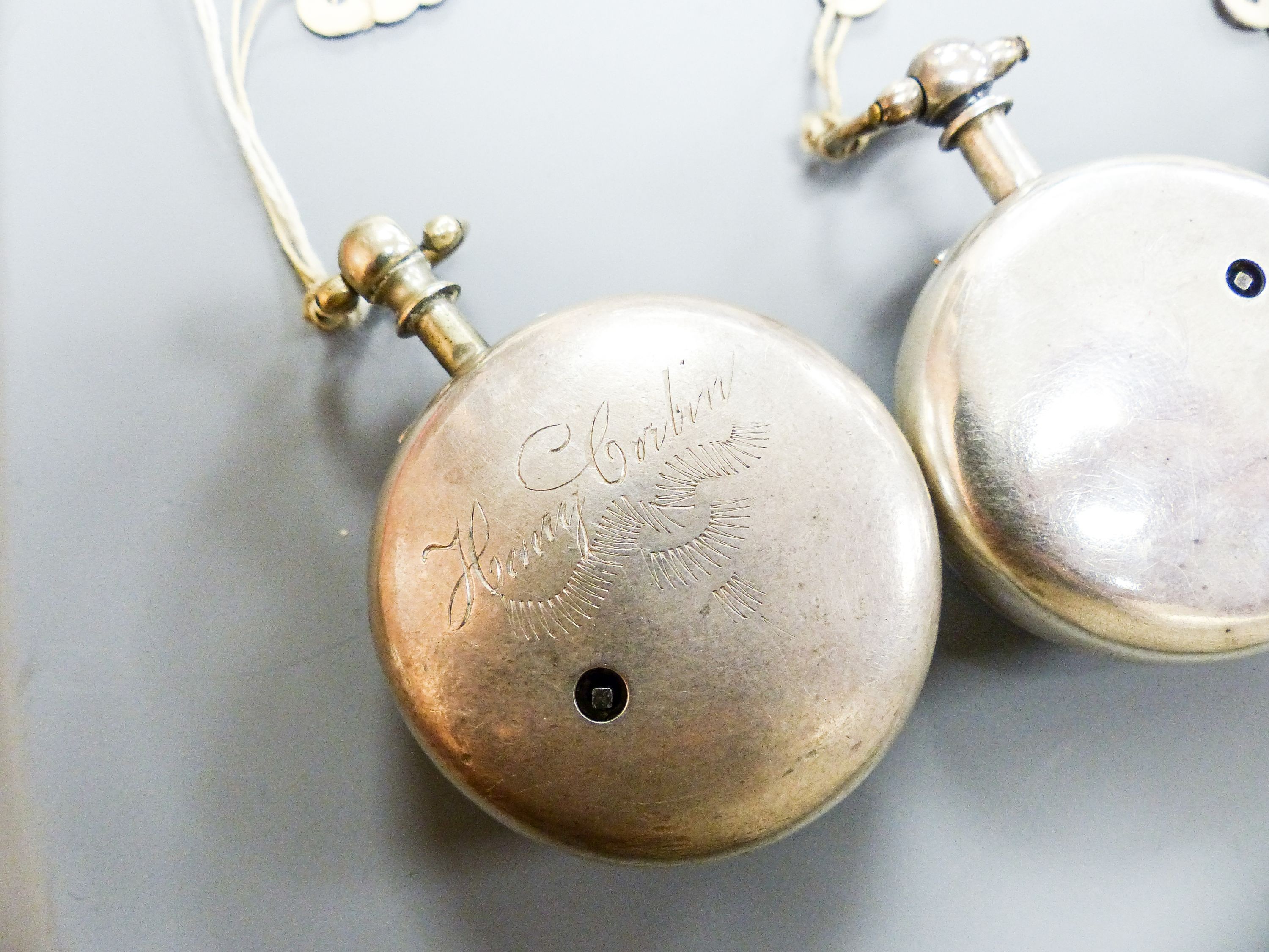 Three 18th/19th century silver pair cased keywind verge pocket watches, including Newland, London.